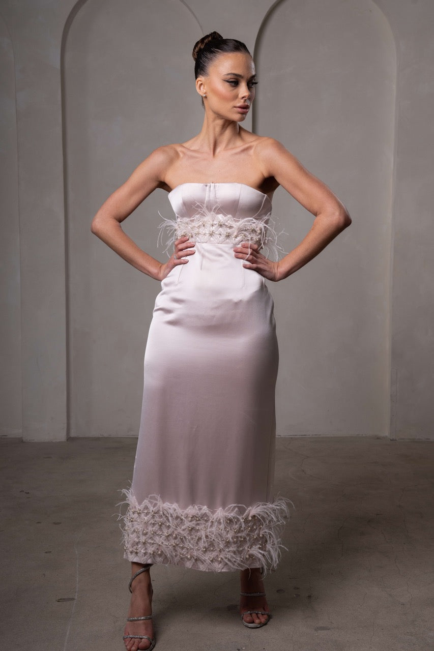 The Gia strapless light pink gown with beading and feather detail
